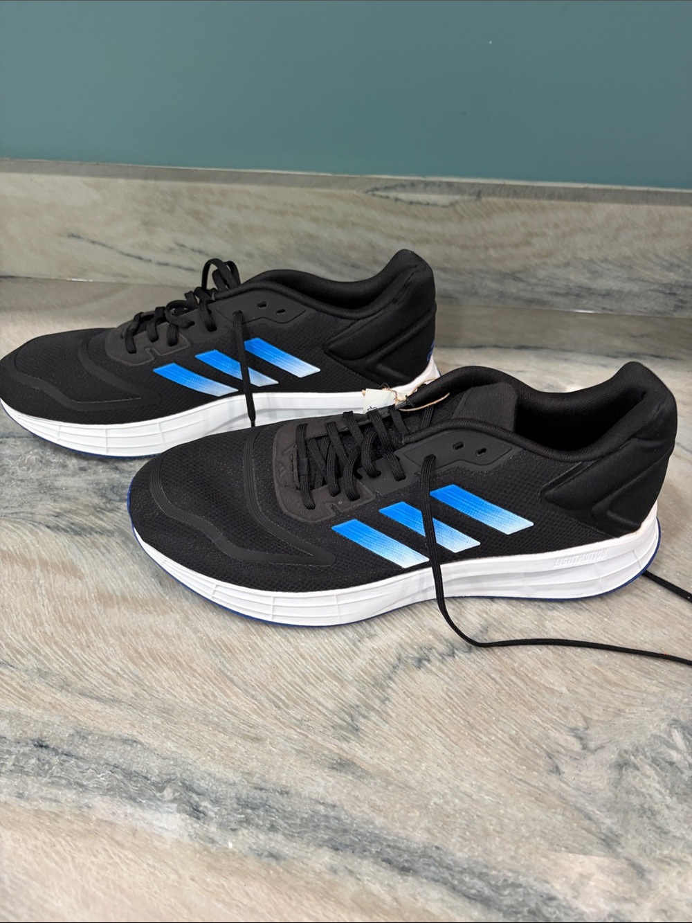 adidas Black Athletic Running Shoes with Blue Accents